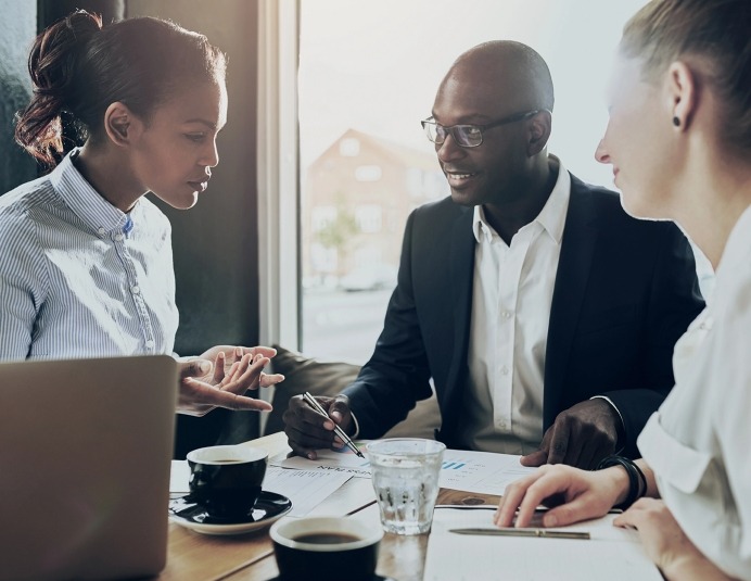 group of people in meeting discussion