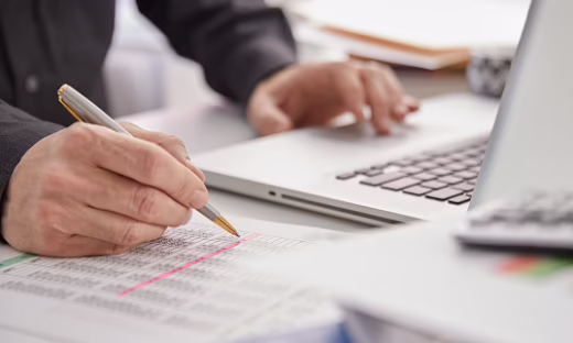 accountant analyzing investment chartwth